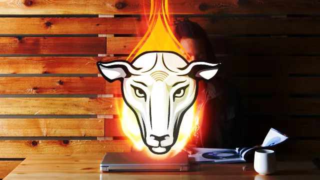 Logo of a bull with flames against a wooden background.