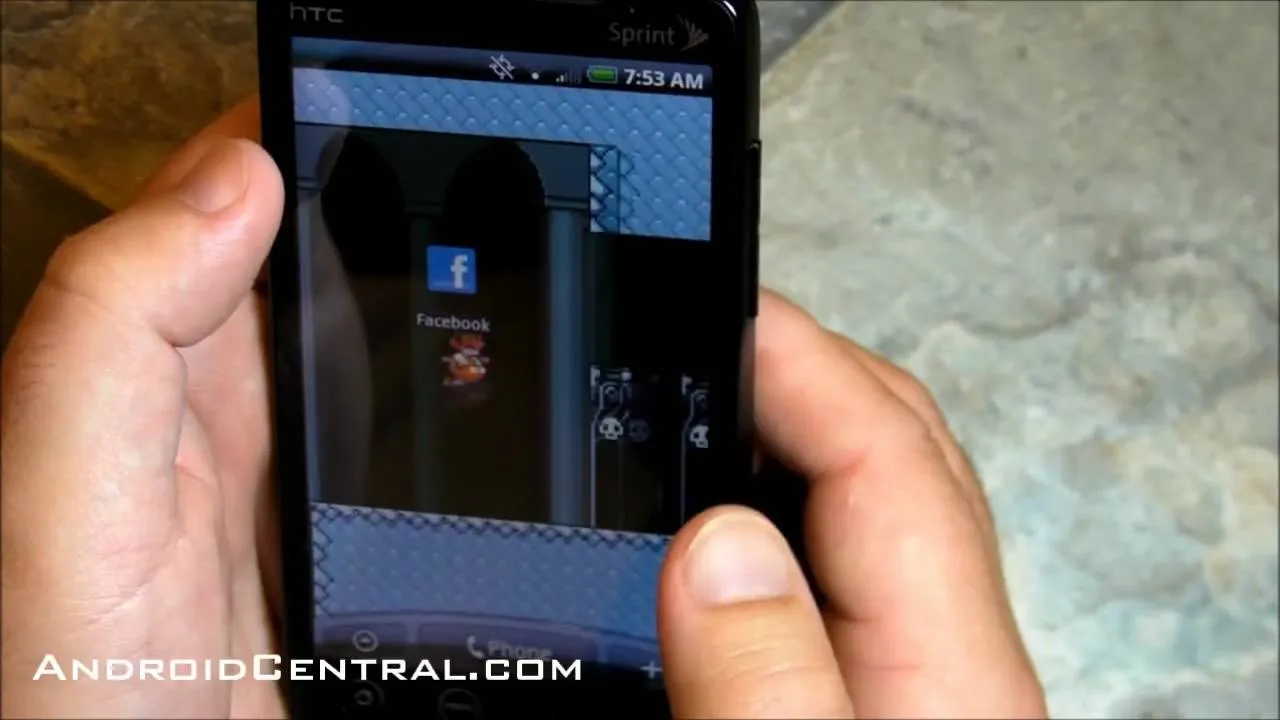 A person holding a smartphone displaying a mobile application on the screen.