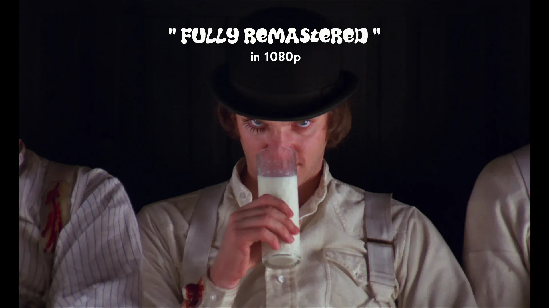 "Man in bowler hat sipping milk with text 'FULLY REMASTERED' in 1080p above"