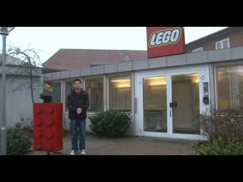 LEGO store exterior with a large red brick display.