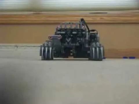 Remote-controlled robot on a flat surface.