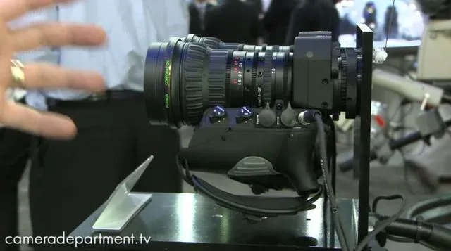 Camera equipment on display at a professional event.