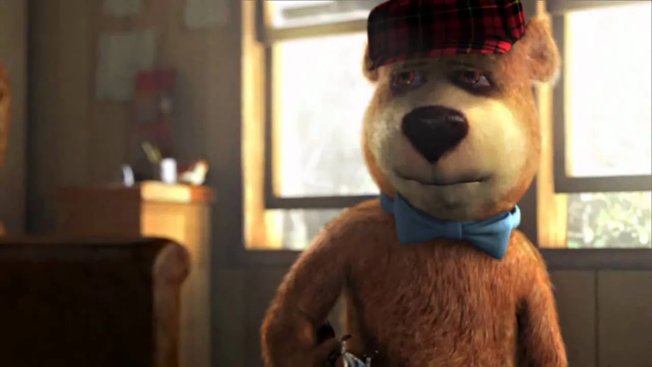 Animated bear character wearing a plaid hat and blue bowtie.