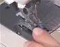 How to Use a sew on button foot on a sewing machine cover