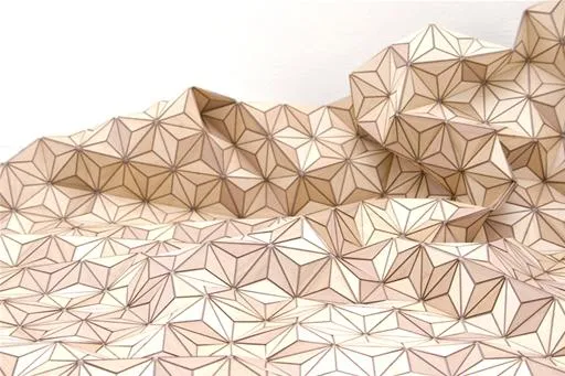 Geometric paper sculpture with a textured, layered design.