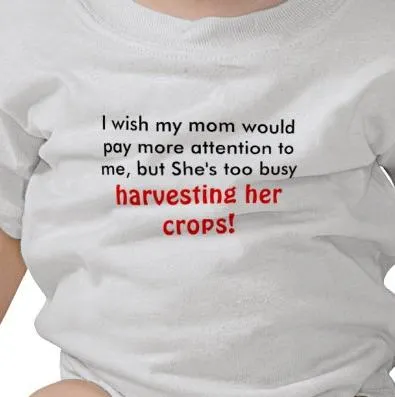 Child wearing a humorous t-shirt about a busy mom harvesting crops.