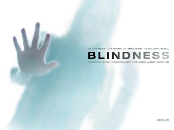 Blurred figure with a hand reaching out, overlaid with the word "BLINDNESS."