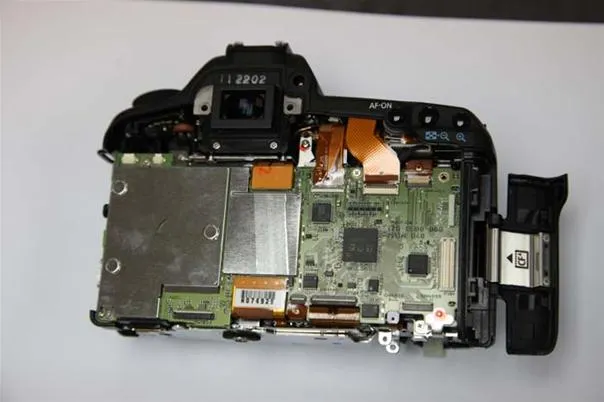 Close-up view of the internal components of a digital camera.