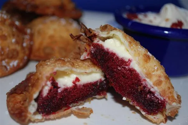 Red velvet cake stuffed pastries with cream cheese filling.