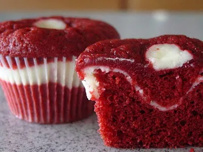 Red velvet cupcakes with cream cheese filling.