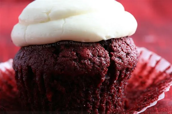 Red velvet cupcake with cream cheese frosting.
