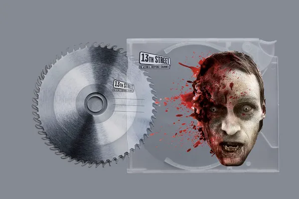 Album cover featuring a blood-splattered face next to a circular saw blade.