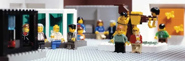 A colorful scene depicting various LEGO figurines in a modern urban setting.