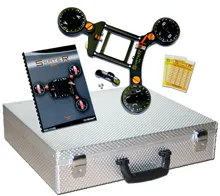 Skateboard assembly kit with tools and instructional manual in a metal case.