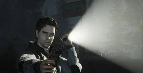 A man holding a flashlight in a dark environment.