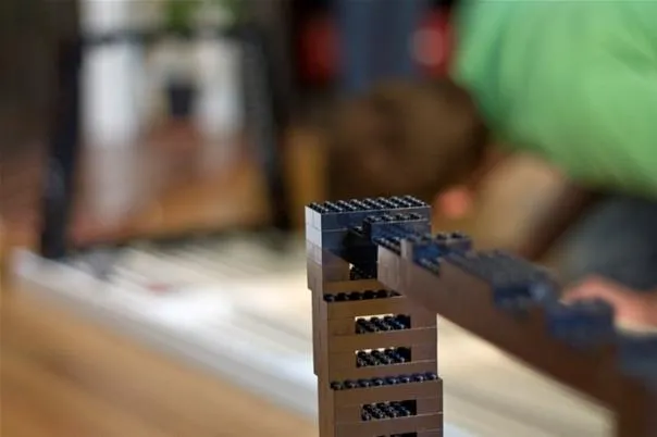 Close-up of a building made from construction blocks.