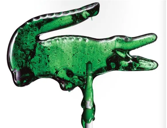 Green crocodile logo.