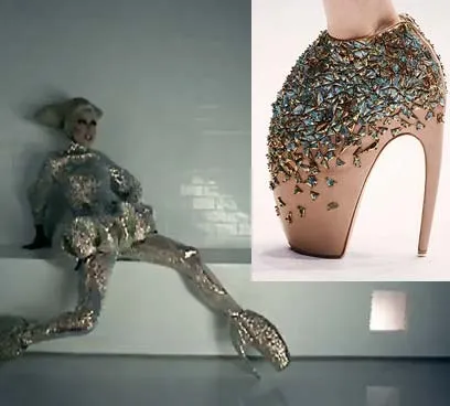 Fashion editorial featuring a sculptural metallic figure and an ornate high-heel shoe.