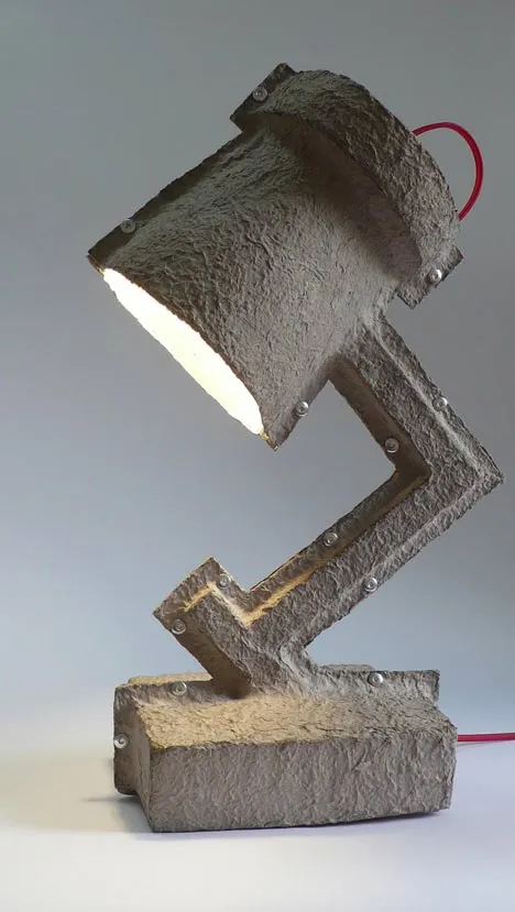 Modern geometric desk lamp with a unique design.