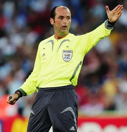 Referee signaling during a soccer match.