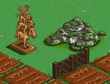 Statue of a horse rider beside a rocky mound in a green landscape.