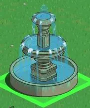 Decorative water fountain on a green lawn.