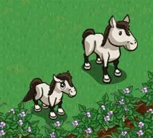Two cartoon-style horses, one large and one small, standing on grass with flowers nearby.