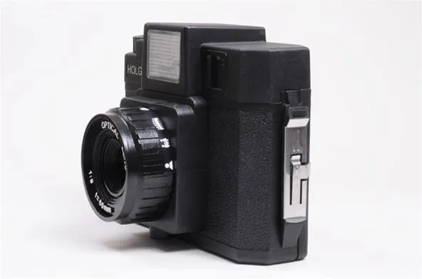 Vintage black film camera on a white background.