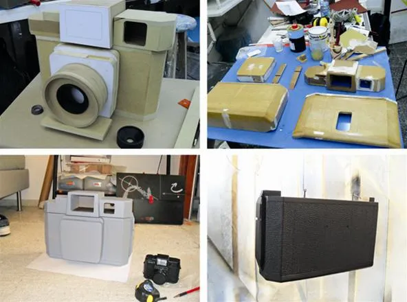 Various camera models and equipment displayed on a table.