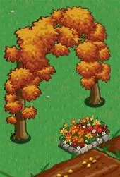Autumn-themed garden arch with orange foliage and flower bed.