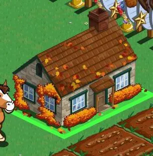 A cartoon-style farmhouse with autumn leaves and a cow nearby.