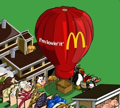 Hot air balloon with McDonald's logo over a cartoon scene.