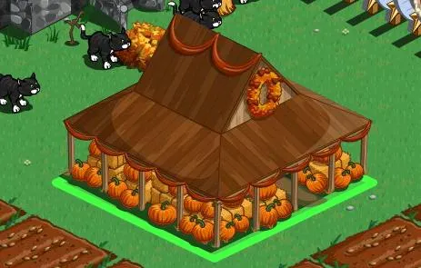 Pumpkin-decorated autumn tent in a farm setting.
