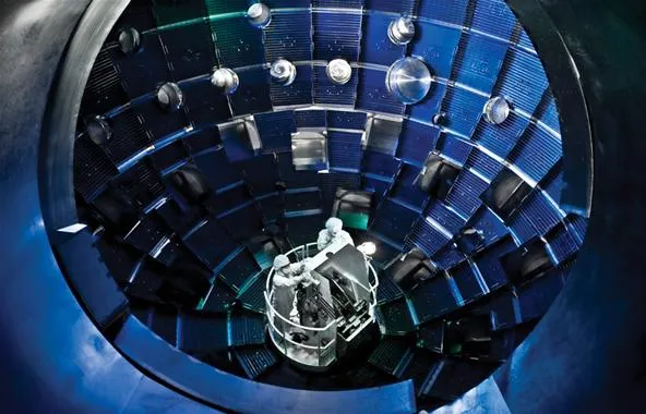 Interior view of a fusion reactor experiment with a central chamber and surrounding structures.