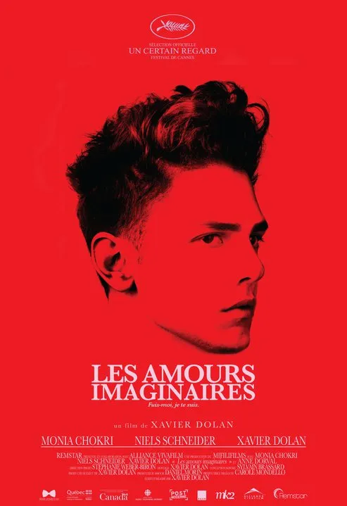 Movie poster for "Les Amours Imaginaires" featuring a prominent profile in red tones.