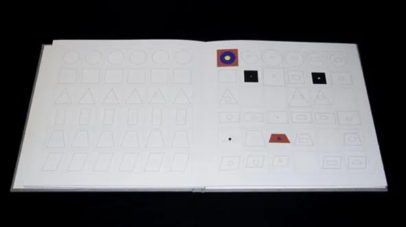 Abstract design with geometric shapes on a blank page.