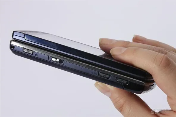 Hand holding a sleek smartphone.
