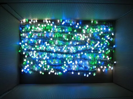 Colorful blue and green decorative lights arranged in a wavy pattern.