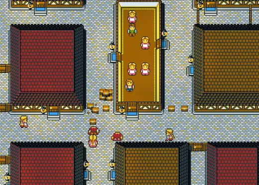Aerial view of a pixelated village square with characters and buildings.