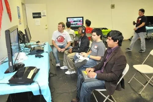 People participating in a gaming event at a community center.
