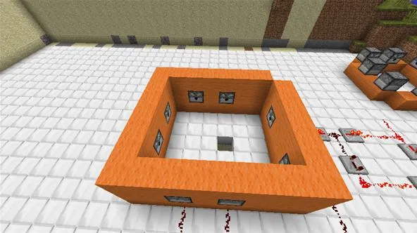 Minecraft build of a square orange structure with windows.