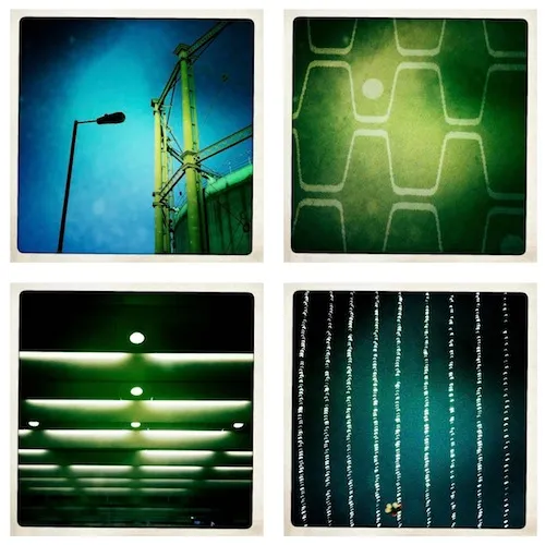 Abstract geometric patterns with varying shades of green and lighting effects.