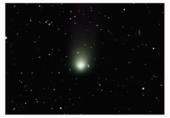 A glowing comet against a starry night sky.