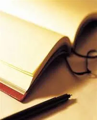 Open notebook with a pen.
