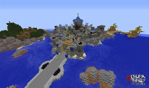 Aerial view of a detailed castle built in a block-style game, surrounded by water and land features.