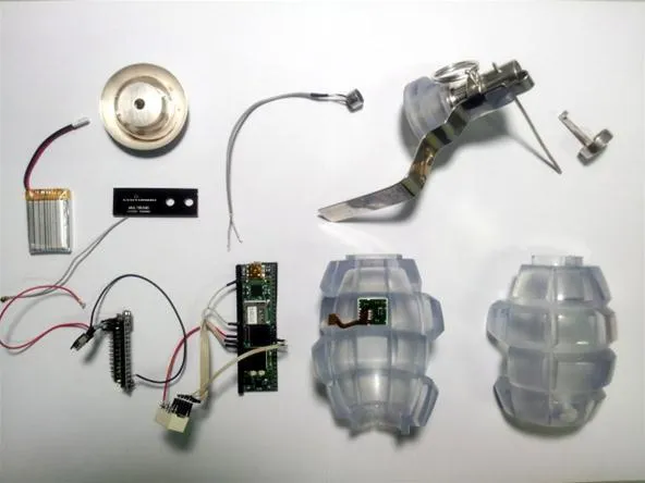 Disassembled electronic components arranged on a white background.