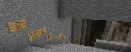 Minecraft scene showing signs on stairs in a stone structure.