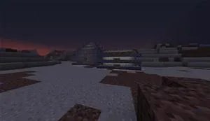 A serene landscape at dusk featuring geometric rock formations and sandy terrain.