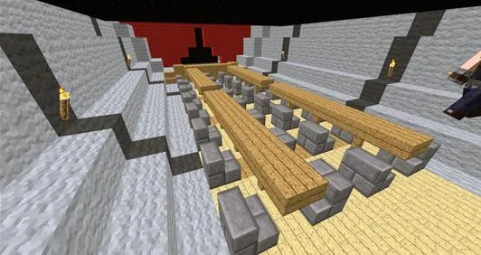 Interior view of a Minecraft-style meeting room with a long wooden table and stone seating.