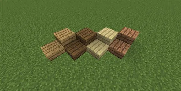 Minecraft wooden plank blocks arranged on grass.